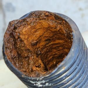 beginings of clogged discharge pipe